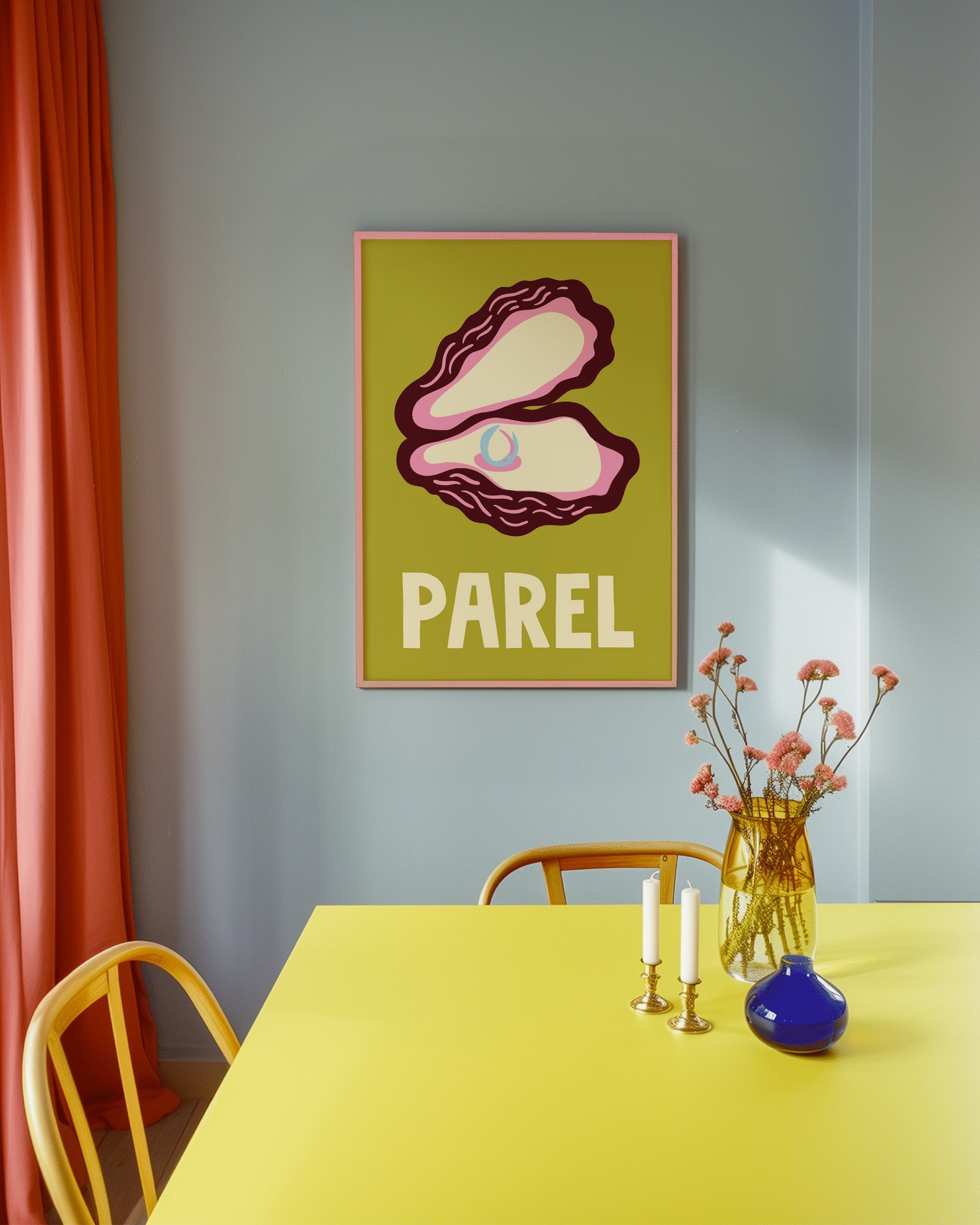 A framed art print featuring a stylized clam shell illustration and the word 'PAREL' in bold cream letters on an olive-green background, hanging on a light blue wall above a bright yellow table with chairs and a vase of flowers.